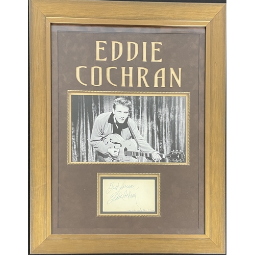 20 - EDDIE COCHRAN - SIGNED DISPLAY. A framed and glazed display to include a page from an autograph book... 