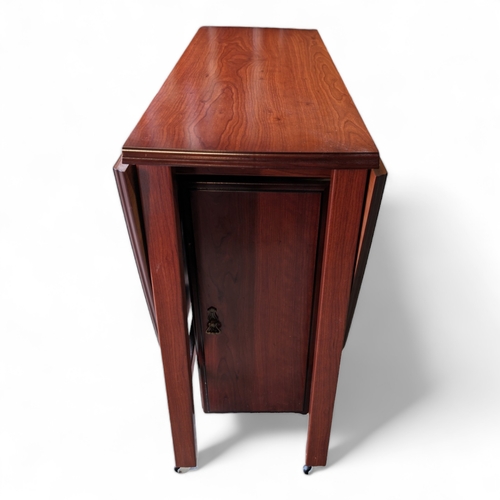 15 - Mid Century Drop Leaf Compact Table With Storage Cupboard
140cm by 90cm by 77cm