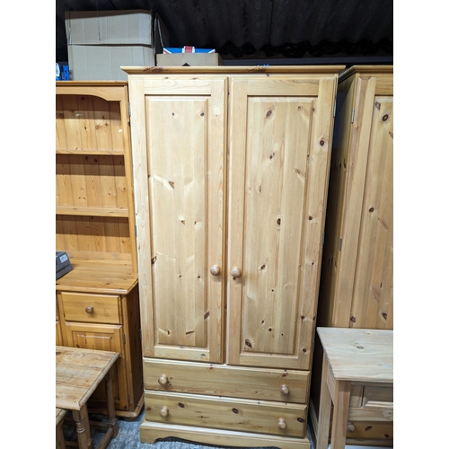 8 - Solid Pine Double Wardrobe
82cm by 53cm by 180 cm
Good Condition with minor age related wear and Scu... 