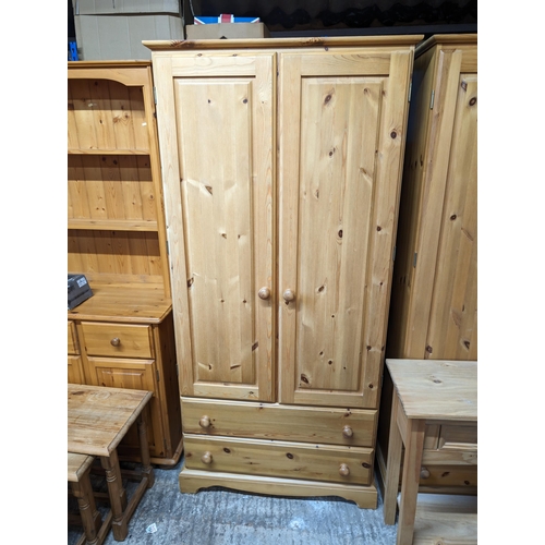 9 - Solid Pine Double Wardrobe 
82cm by 53cm by 180 cm
Good Condition with minor age related wear and Sc... 