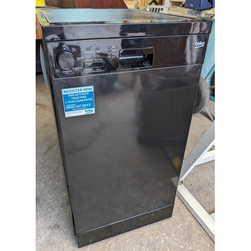 10B - Beko Black Slimline Dishwasher - In Good Order
45cm x 58cm x 85