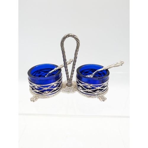 297 - White Metal and Blue Glass Salt Cellars With Spoons, Along With A Murano Gondola And White Metal Sal... 