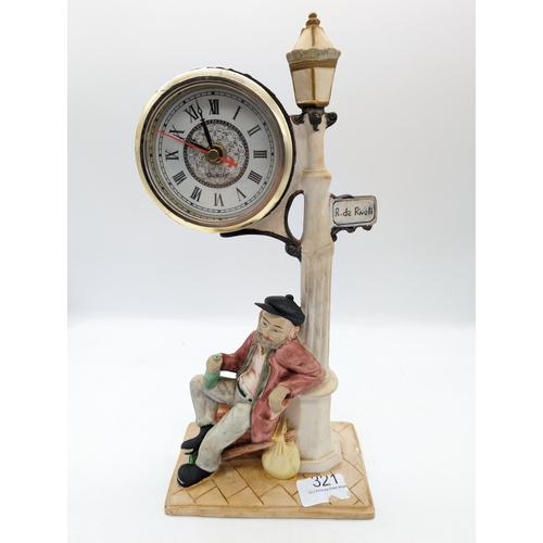 321 - Vintage Traveller Resting Upon A Streetlamp Quartz Mantle Clock
16x35