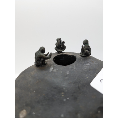 342 - Unusual Sculpture Candle / Tealight Holder, Large Metallic sculpture of pebble with figures around a... 