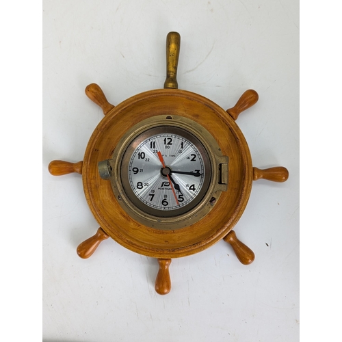 84 - Excellent Vintage Brass Plastimo Quartz Ships Time Clock Mounted on Ships Wheel with Brass Handle
30... 