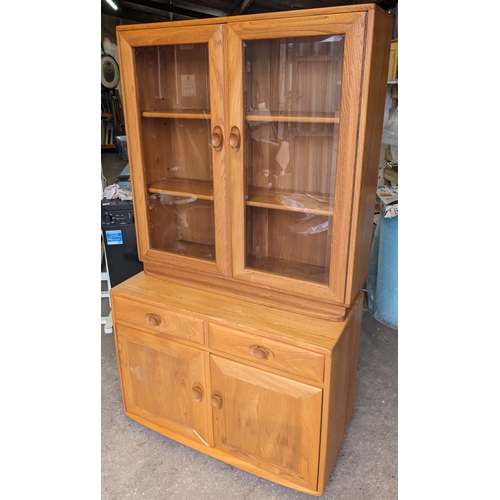 19A - Excellent Ercol Windsor - Blonde ercol Display case / Bookcase 

Condition Overall is good, needs on... 