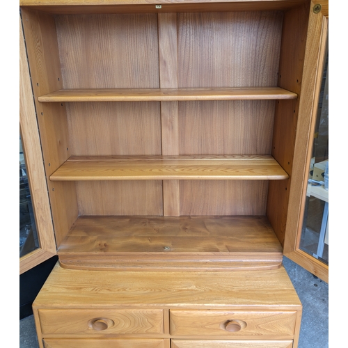 19A - Excellent Ercol Windsor - Blonde ercol Display case / Bookcase 

Condition Overall is good, needs on... 