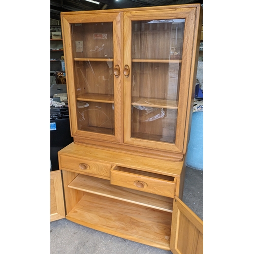 19A - Excellent Ercol Windsor - Blonde ercol Display case / Bookcase 

Condition Overall is good, needs on... 