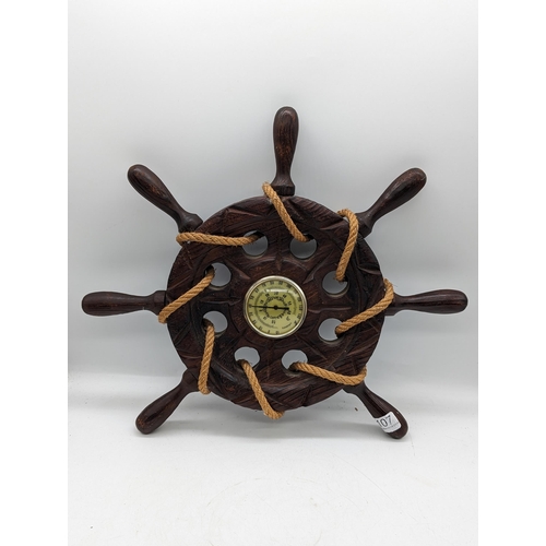 61 - Vintage Barometer Mounted Into Hand Carved Ships Wheel Design, With Rope Twist. One Handle Missing 4... 