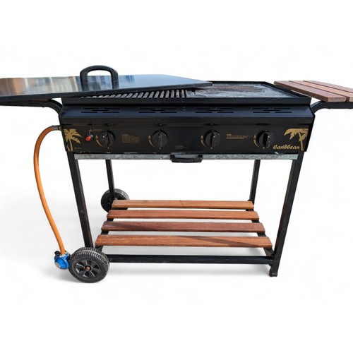 273 - EXCELLENT CARIBBEAN GRIDDLE BBQ ON WHEELS WITH WOODEN SLAT BASE AND GRIDDLE COVER. UNTESTED BUT APPE... 