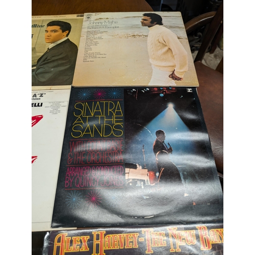 330 - Bundle of 10 Vinyl's Plus 2 LaserDisc's - Including Sinatra, Elvis Plus Other Artists. sleeves in Fa... 