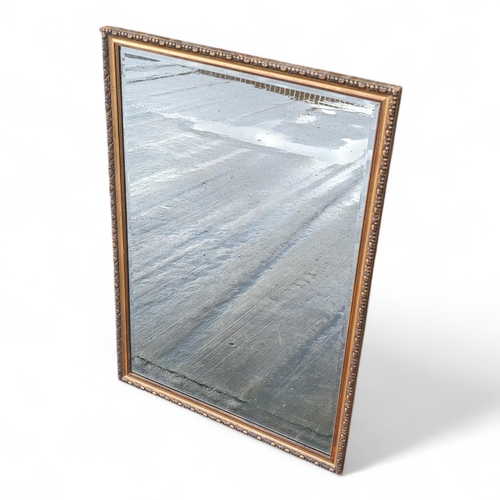 359 - Large Heavy Vintage Bevelled Edge Mirror With Well Beaded and Carved Gilt Style Frame 56x80cm