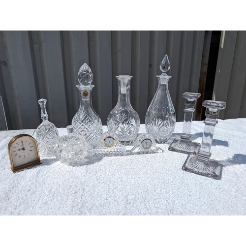 140 - Group Crystal / Cut Glass Decanters With Stoppers, Crystal Miniature Clocks Etc