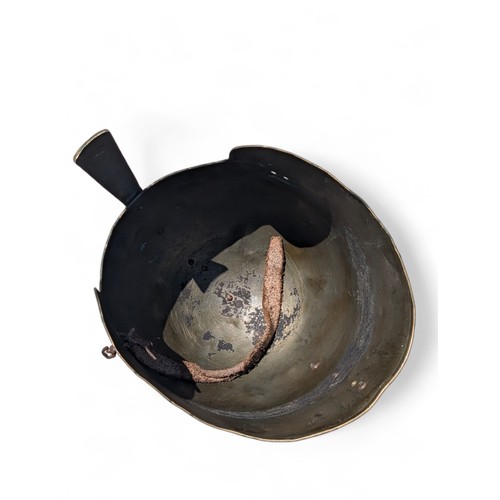 113 - Military Style Helmet With Nose Guard and German Insignia.