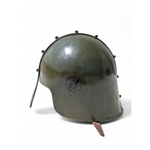 113 - Military Style Helmet With Nose Guard and German Insignia.