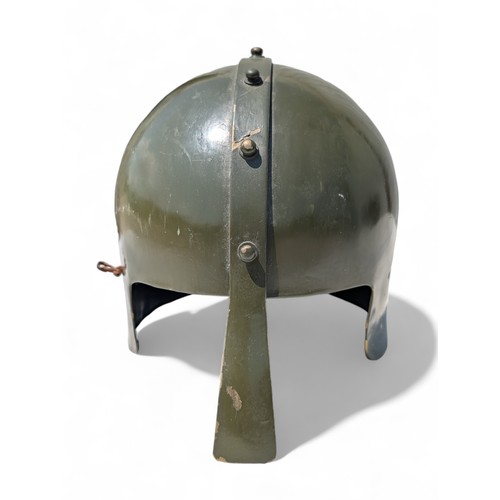 113 - Military Style Helmet With Nose Guard and German Insignia.