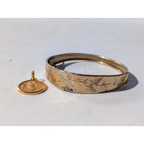 131 - 9Ct Gold Leaf Bangle , Marked 375 Inside. Tests as Gold 6cm Diameter 9.44g Along With Gold tone Like... 