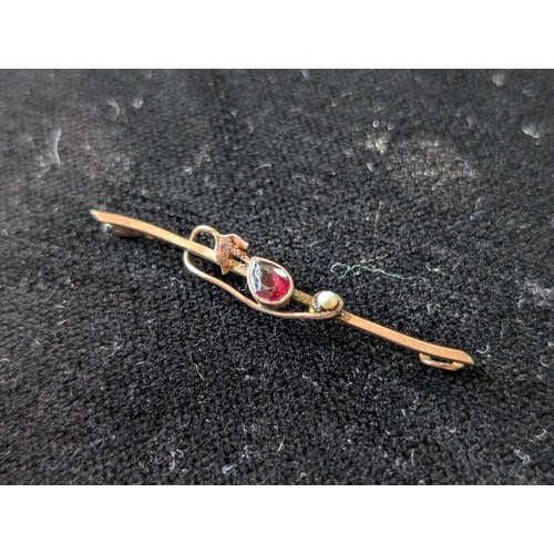 146 - Antique 9ct Gold Pearl Seed With Red Stone Likely Small Ruby Brooch, Slightly Misshapen 5.5cm 1.84g