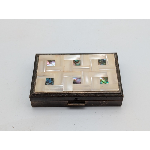 253 - 1950s Clover Mother Of Pearl Musical Powder Box Excellent Condition, Appears to Be Working. Good Con... 