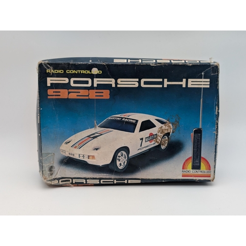 375 - Vintage Boxed Porsche 928 Radio Controlled Car, Along With Super Sonic Plane Toy