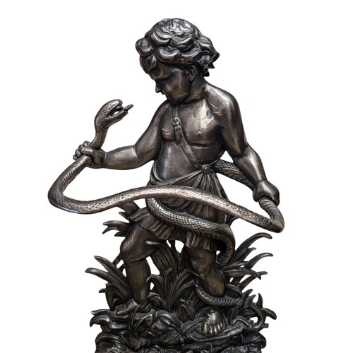 30 - A Coalbrookdale Style Cast Iron Stick Stand in The Form of The Infant Hercules Fighting a Snake Exce... 