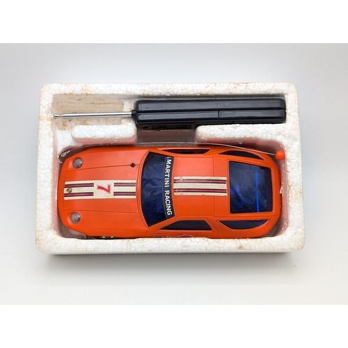 176 - Vintage Boxed Porsche 928 Radio Controlled Car, Along With Super Sonic Plane Toy