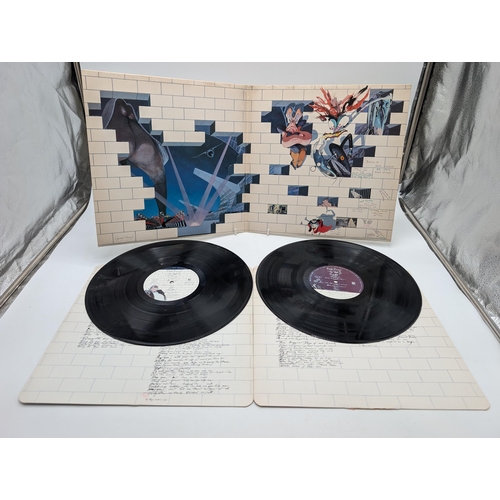281 - A first UK pressing of Pink Floyd 'The Wall' SHDW411. Vinyl is NM Inner Sleeves Rounded Corners VG+,... 
