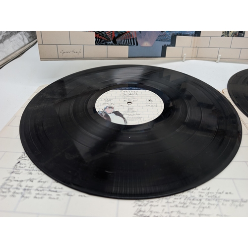 281 - A first UK pressing of Pink Floyd 'The Wall' SHDW411. Vinyl is NM Inner Sleeves Rounded Corners VG+,... 