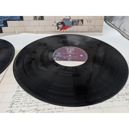 281 - A first UK pressing of Pink Floyd 'The Wall' SHDW411. Vinyl is NM Inner Sleeves Rounded Corners VG+,... 