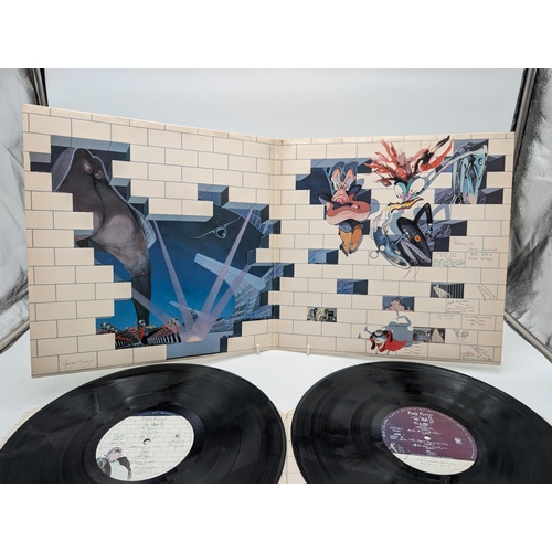 281 - A first UK pressing of Pink Floyd 'The Wall' SHDW411. Vinyl is NM Inner Sleeves Rounded Corners VG+,... 