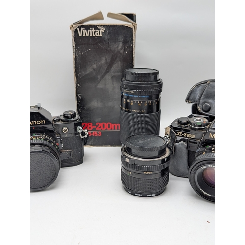 332 - A Canon A1 35mm film SLR & Minolta X700 with Canon Lens FD 50mm 1:1.8 Lens Plus FD 24mm 1:2.8 & carl... 