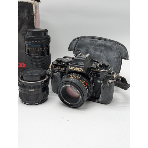 332 - A Canon A1 35mm film SLR & Minolta X700 with Canon Lens FD 50mm 1:1.8 Lens Plus FD 24mm 1:2.8 & carl... 