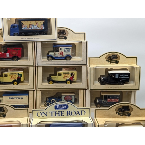 135 - Quantity 23 Tetley / Lledo Diecast Vehicles in Box Of Issue