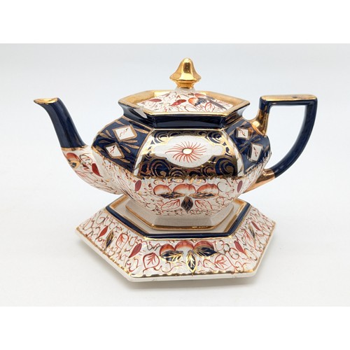 194 - Pair Antique Arthur Wood Imari Pattern teapot With Stand & Coffee Pot. Teapot has Chip as Seen