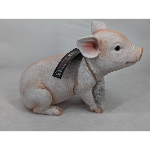 208 - Creature Comforts 19287 Baby Pig Sitting Ornament New in box Of Issue 11x10