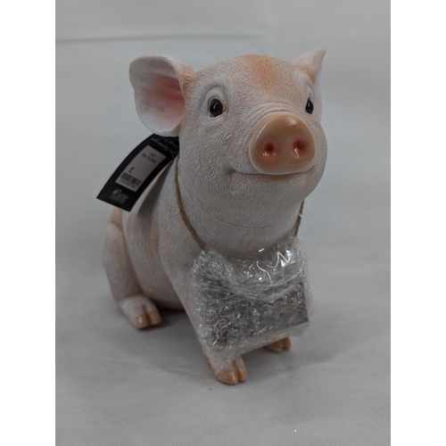 208 - Creature Comforts 19287 Baby Pig Sitting Ornament New in box Of Issue 11x10