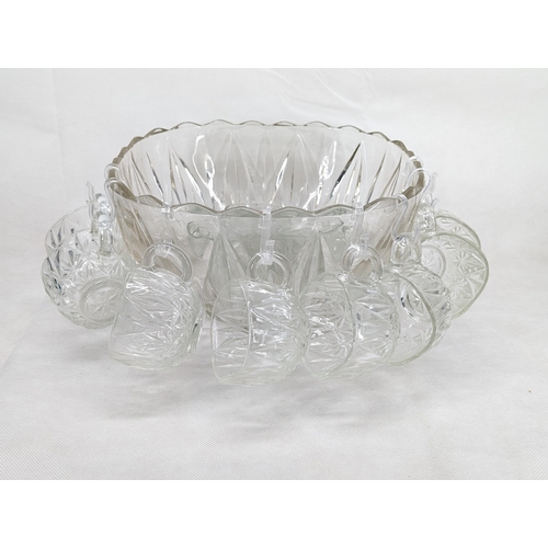 226 - Vintage cut glass punch bowl with 8 glasses plus 4 other similar glasses. 11