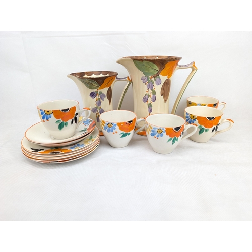 227 - Vintage Myott and son hand painted teaset and jugs, incomplete. Circa 1930's. Largest jug 7