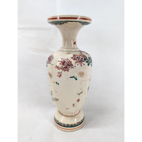 235 - Good pair of hand painted vases with floral bird decoration. Likely antique Japanese satsuma. One wi... 