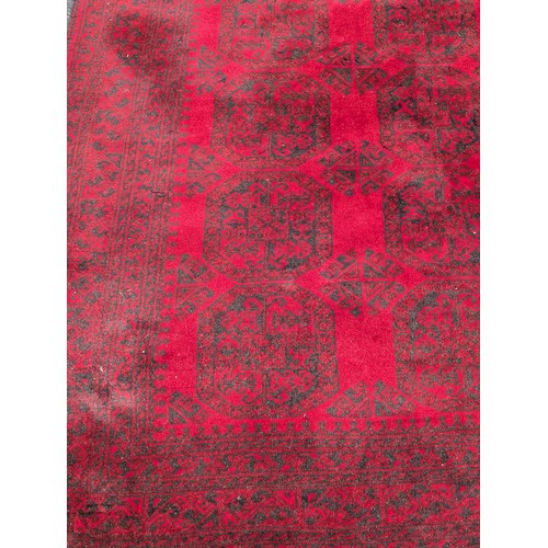 12 - Excellent Hand Knotted Afghan Carpet/ Rug with A few Ware Patches on Red Ground 120x78 inches