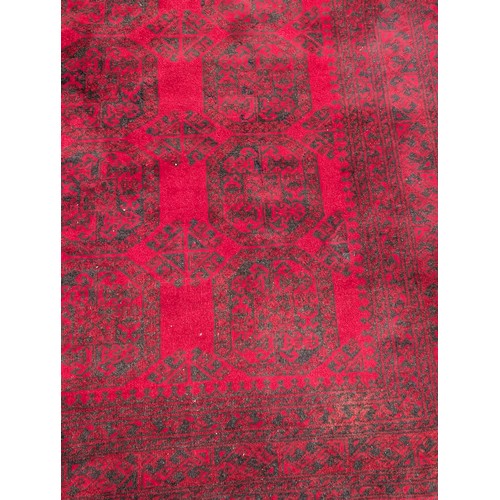 12 - Excellent Hand Knotted Afghan Carpet/ Rug with A few Ware Patches on Red Ground 120x78 inches