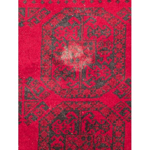 12 - Excellent Hand Knotted Afghan Carpet/ Rug with A few Ware Patches on Red Ground 120x78 inches