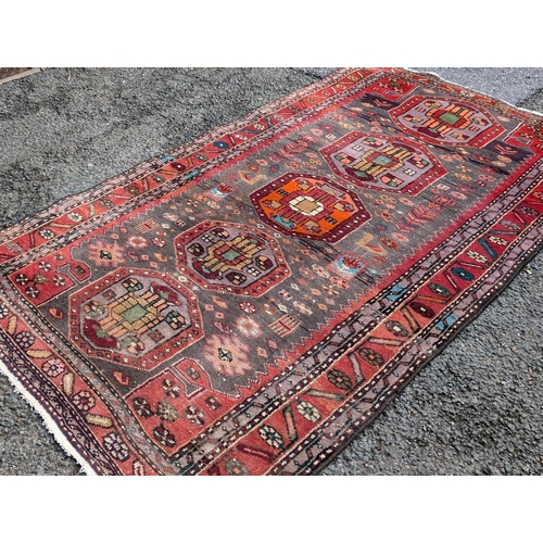 40 - Persian Wool Rug On Pink / Red Ground With Excellent Hand Knotted Design Throughout 110x200cm Appx