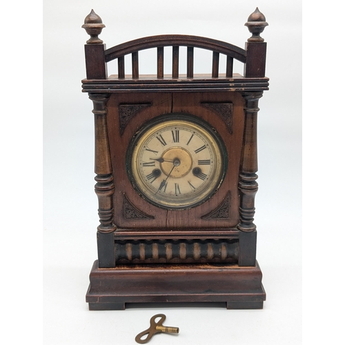 94 - Attractive Antique Wooden Mantel Clock With Carved Designs Throughout. Finials Need Re Attaching 26x... 