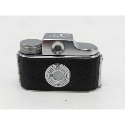 103 - 1950's Mycro Sanwa Camera with Original Leather Case and Box. Appears in Excellent Condition.