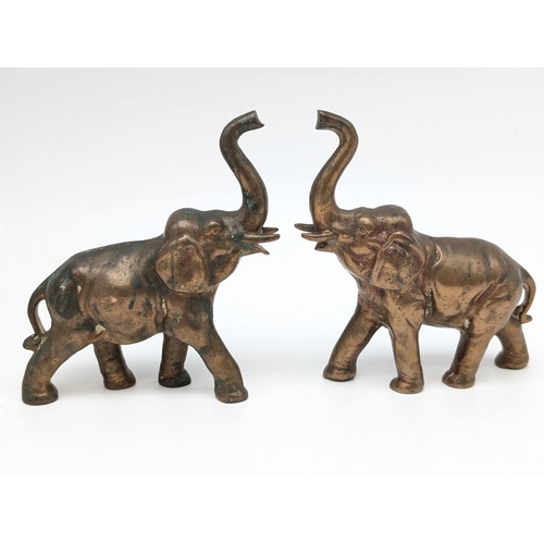 107 - Group of 4 Solid Brass Ornaments - A Doe, A Buck and a pair of Elephants. Tallest 15cm