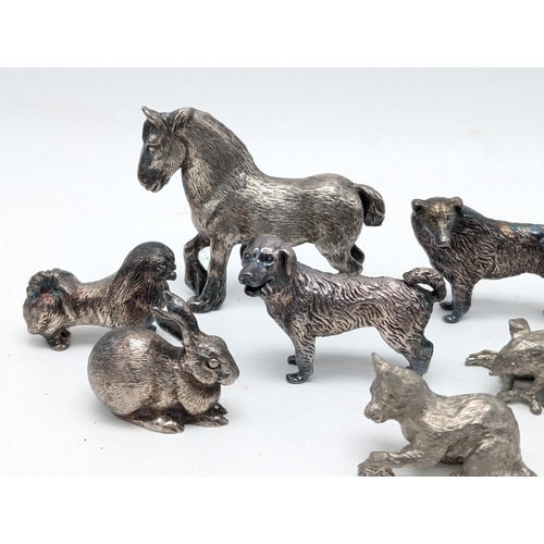 118 - Silver Plated Group of 9 Regal Animals. Largest 4x4inches.