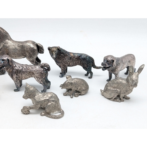 118 - Silver Plated Group of 9 Regal Animals. Largest 4x4inches.