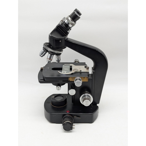 135 - Wild Heerbrug Binocular Microscope