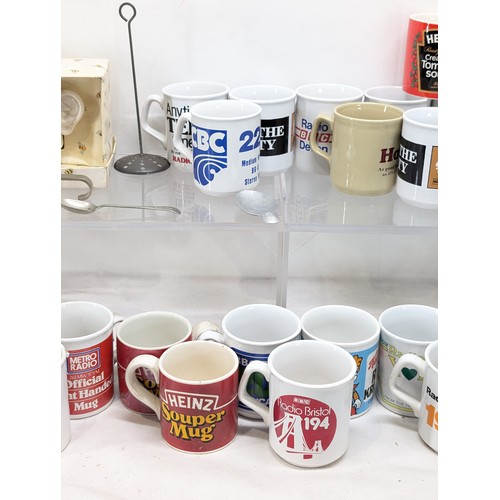 149 - Large Quantity Collectable Mugs - To Include Heinz, Horlicks, Radio Stations, Etc